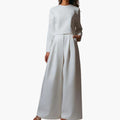 Kvinnors långärmad jumpsuit med plisserade raka ben